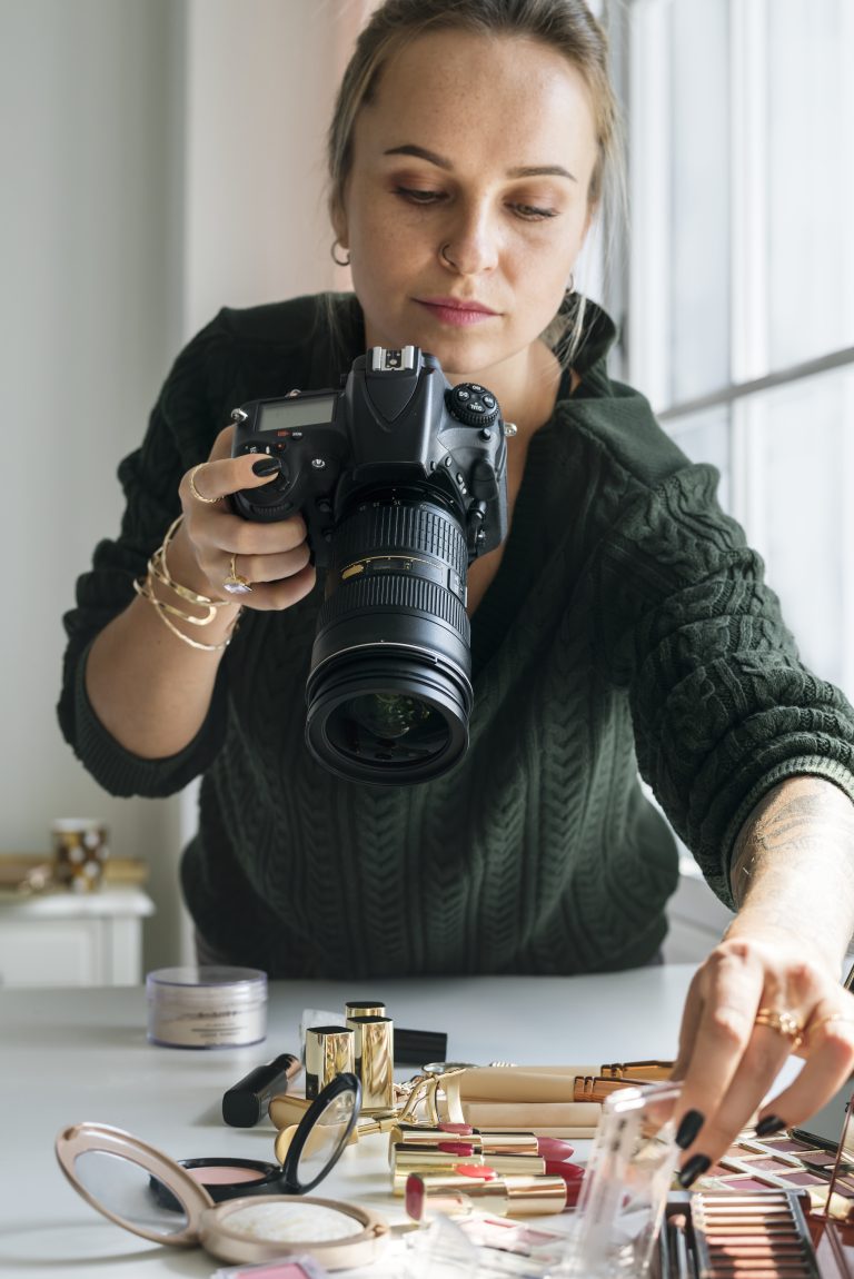 beauty blogger taking photo of cosmetics 2023 11 27 05 36 07 utc